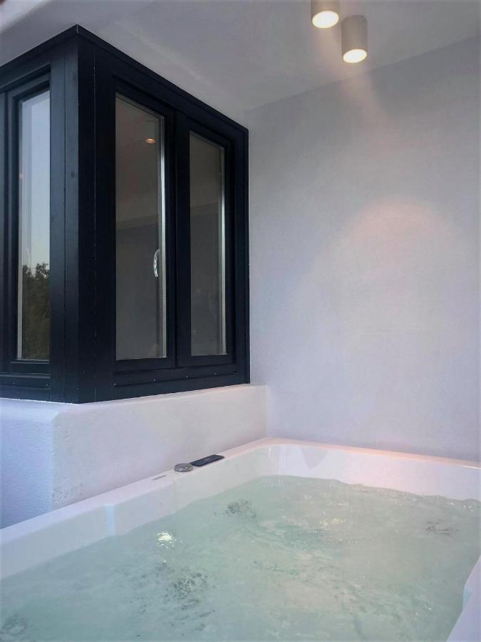 Candele Suites Тира Экстерьер фото