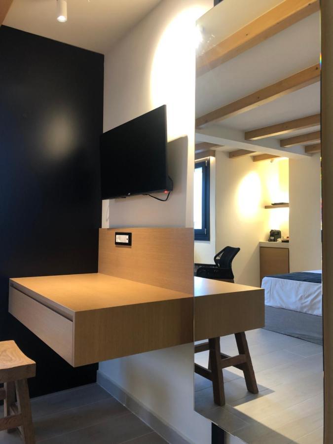 Candele Suites Тира Экстерьер фото