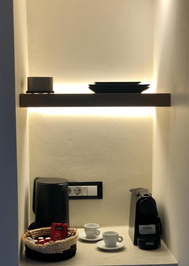 Candele Suites Тира Экстерьер фото